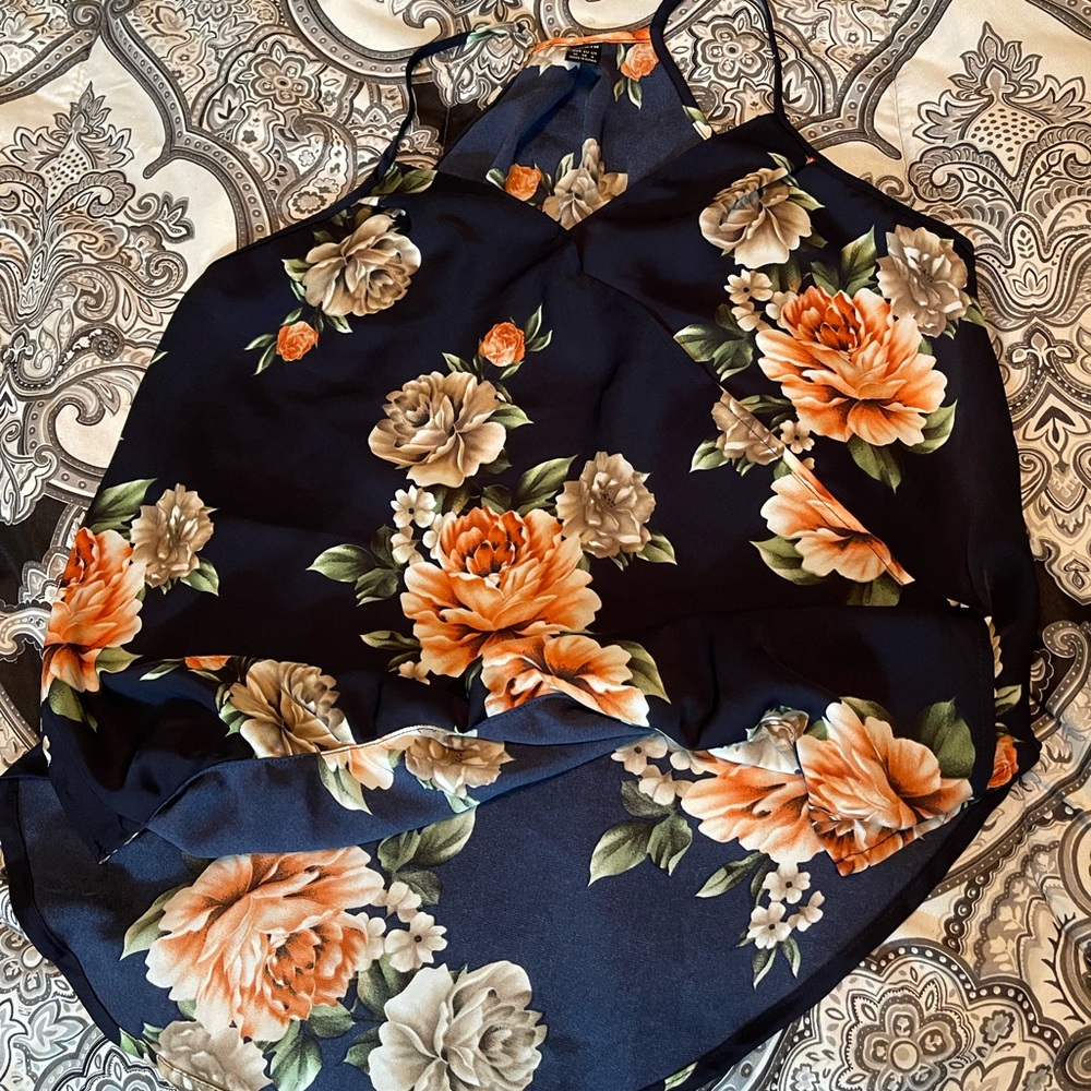 Blue flowery top.  Too big.  Just tried on.